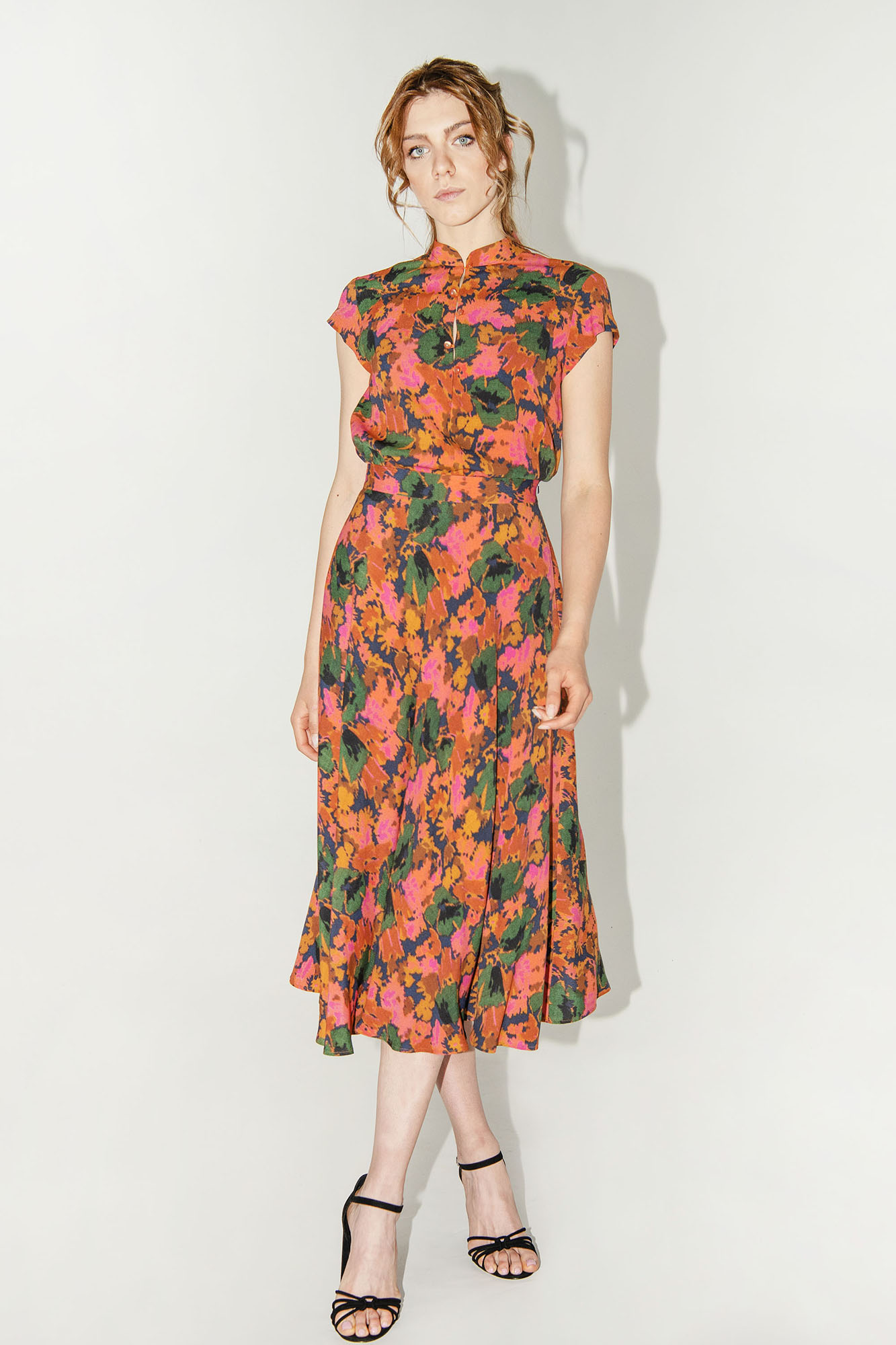 abstract flowers skirt legs crossed 1 • Sassa Björg