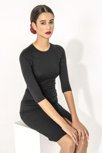 Black raglan sleeve shirt sitting &bull; Sassa Björg
