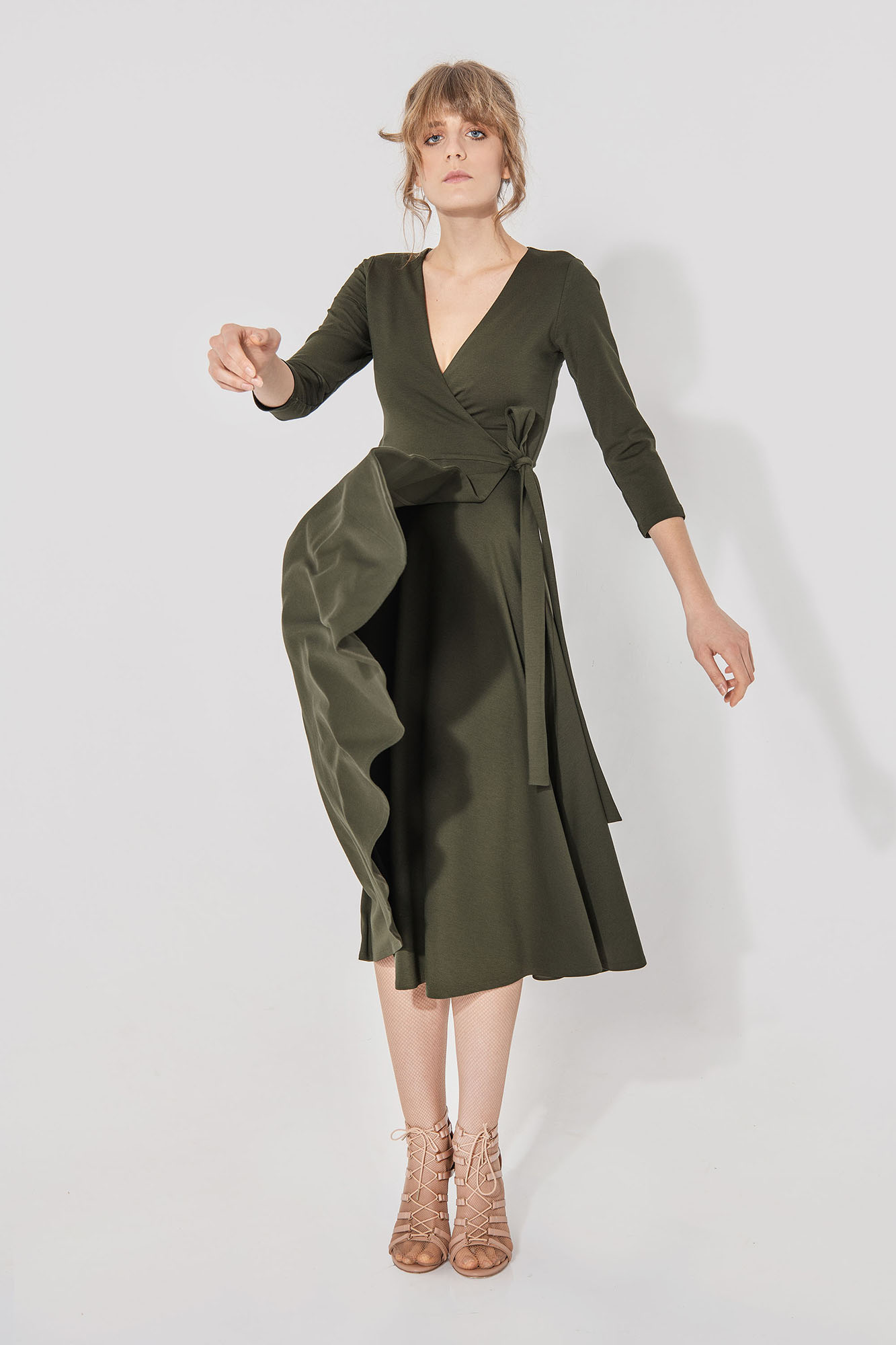 Olive green hug me dress in motion • Sassa Björg
