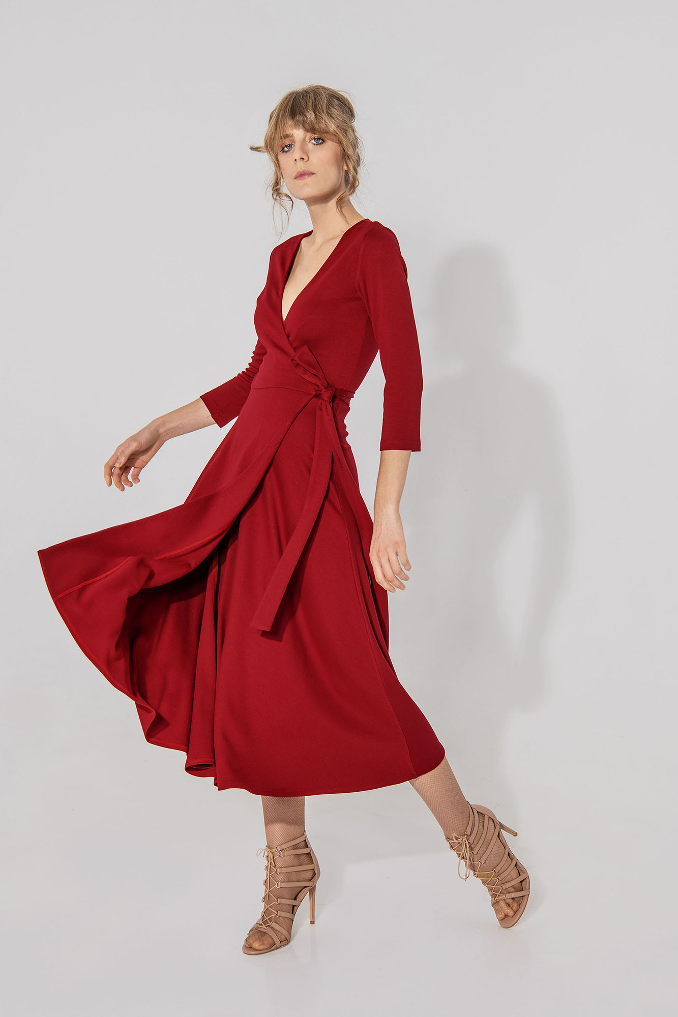 Red hug me dress in motion • Sassa Björg