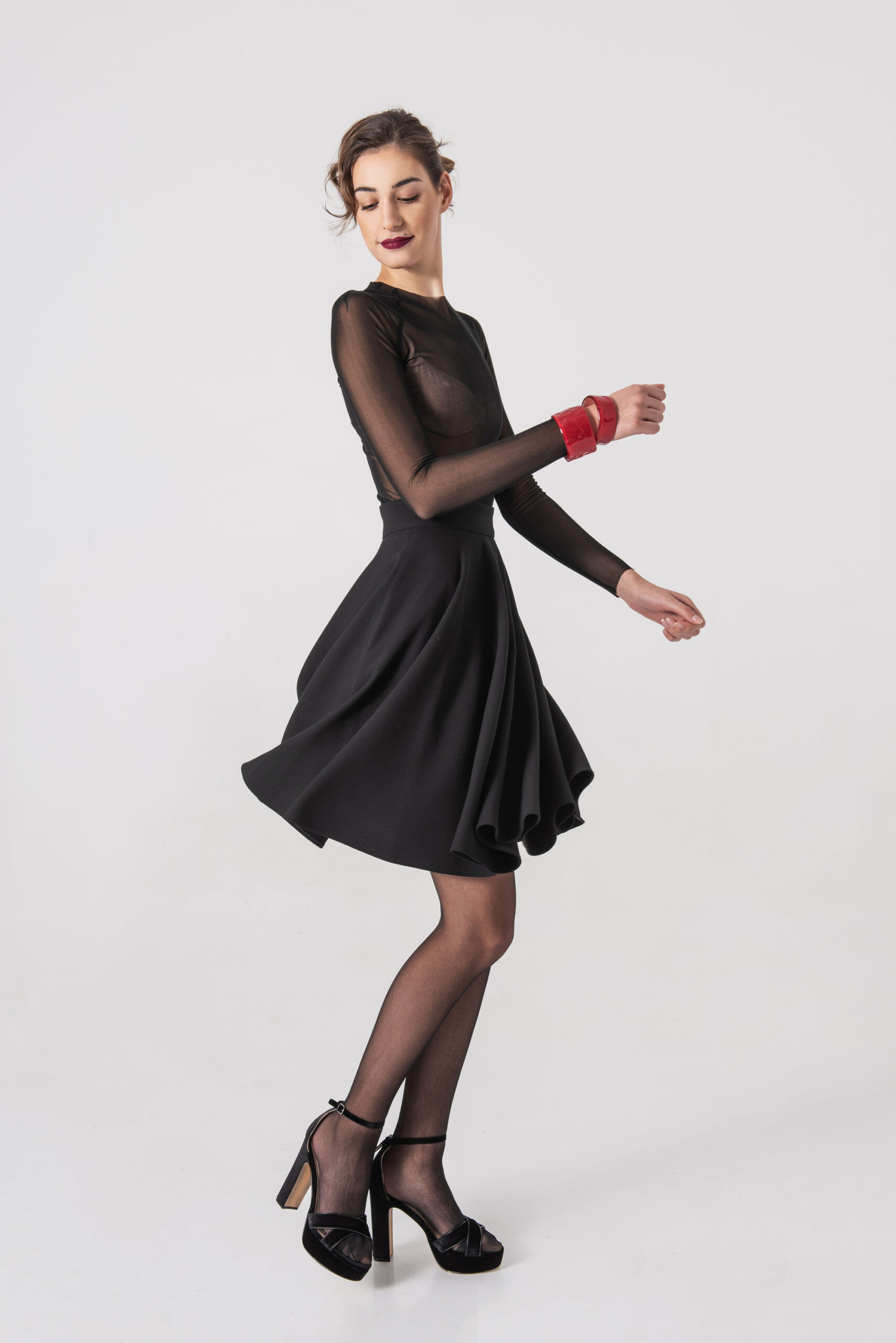 Knee length black circle skirt scaled • Sassa Björg