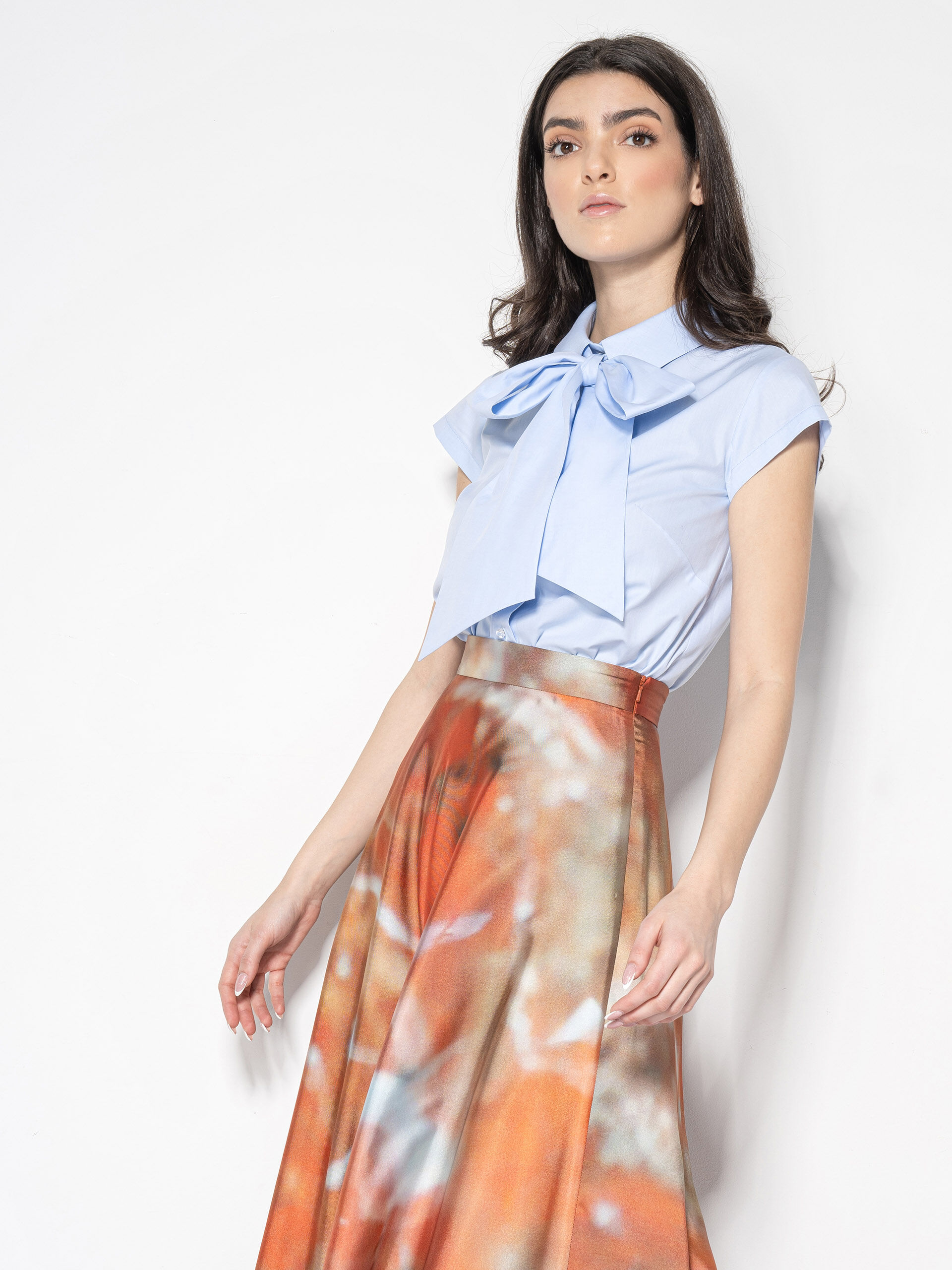 light blue shirt w exaggerated bow crop tied • Sassa Björg