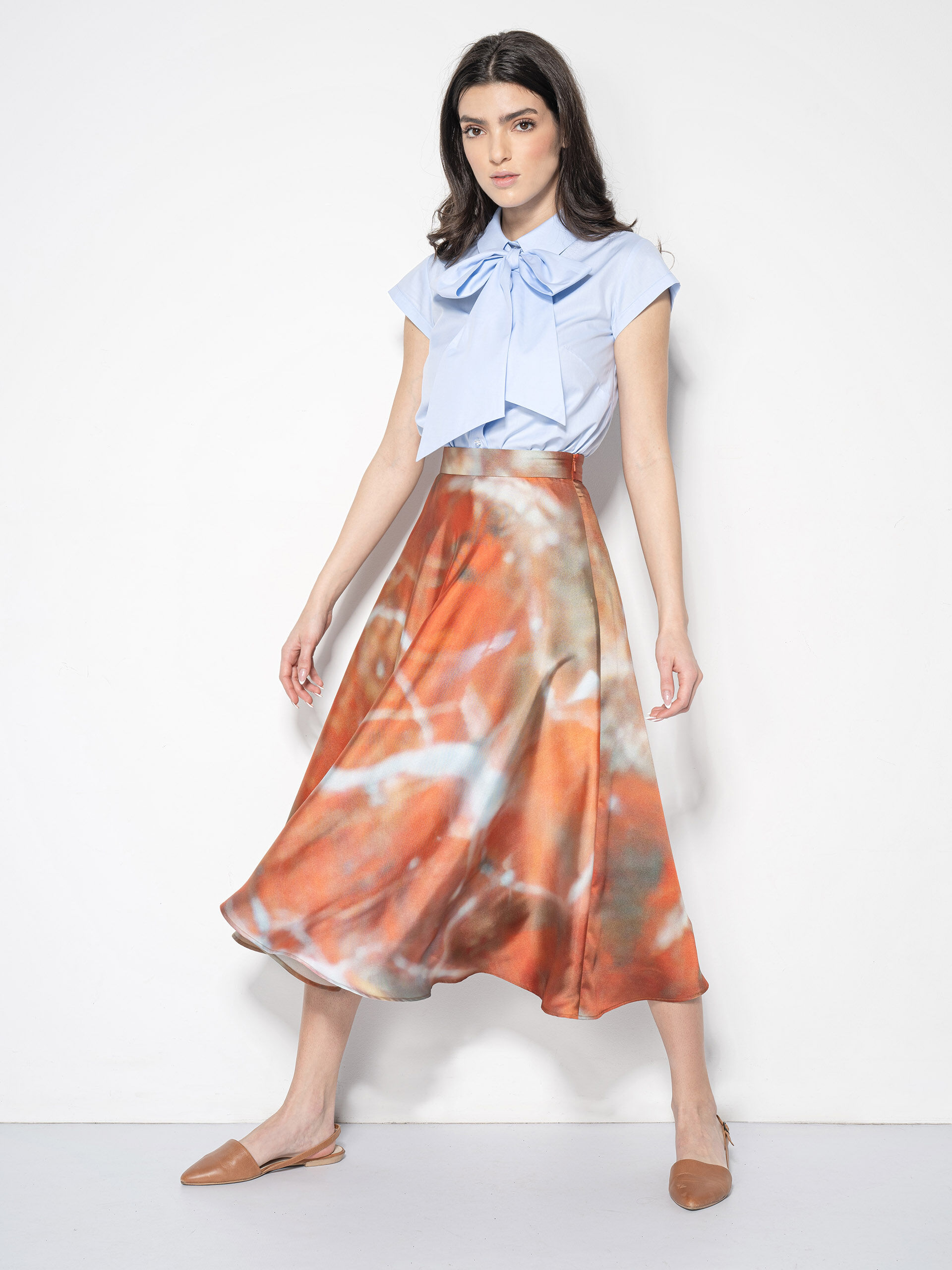 light blue shirt w exaggerated bow full • Sassa Björg