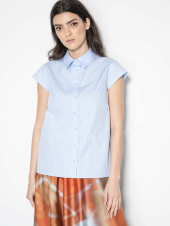 light blue shirt w exaggerated bow without the bow • Sassa Björg