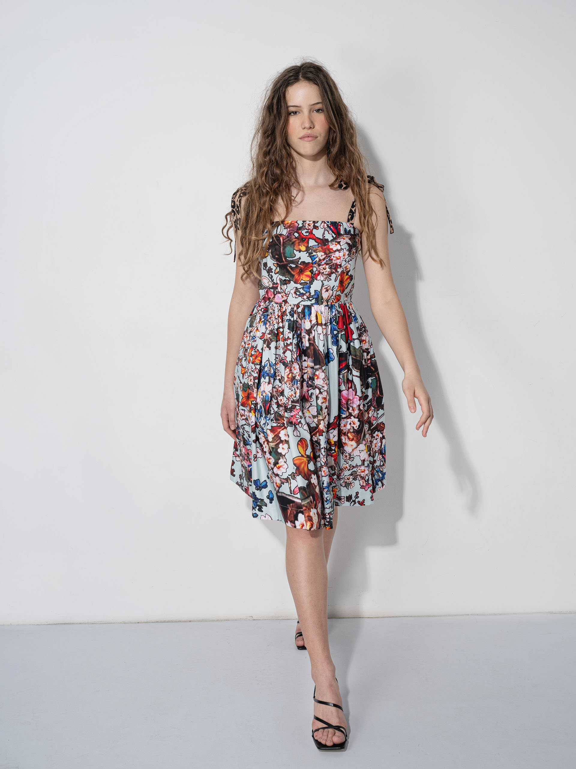 glowing edges floral dress walking • Sassa Björg
