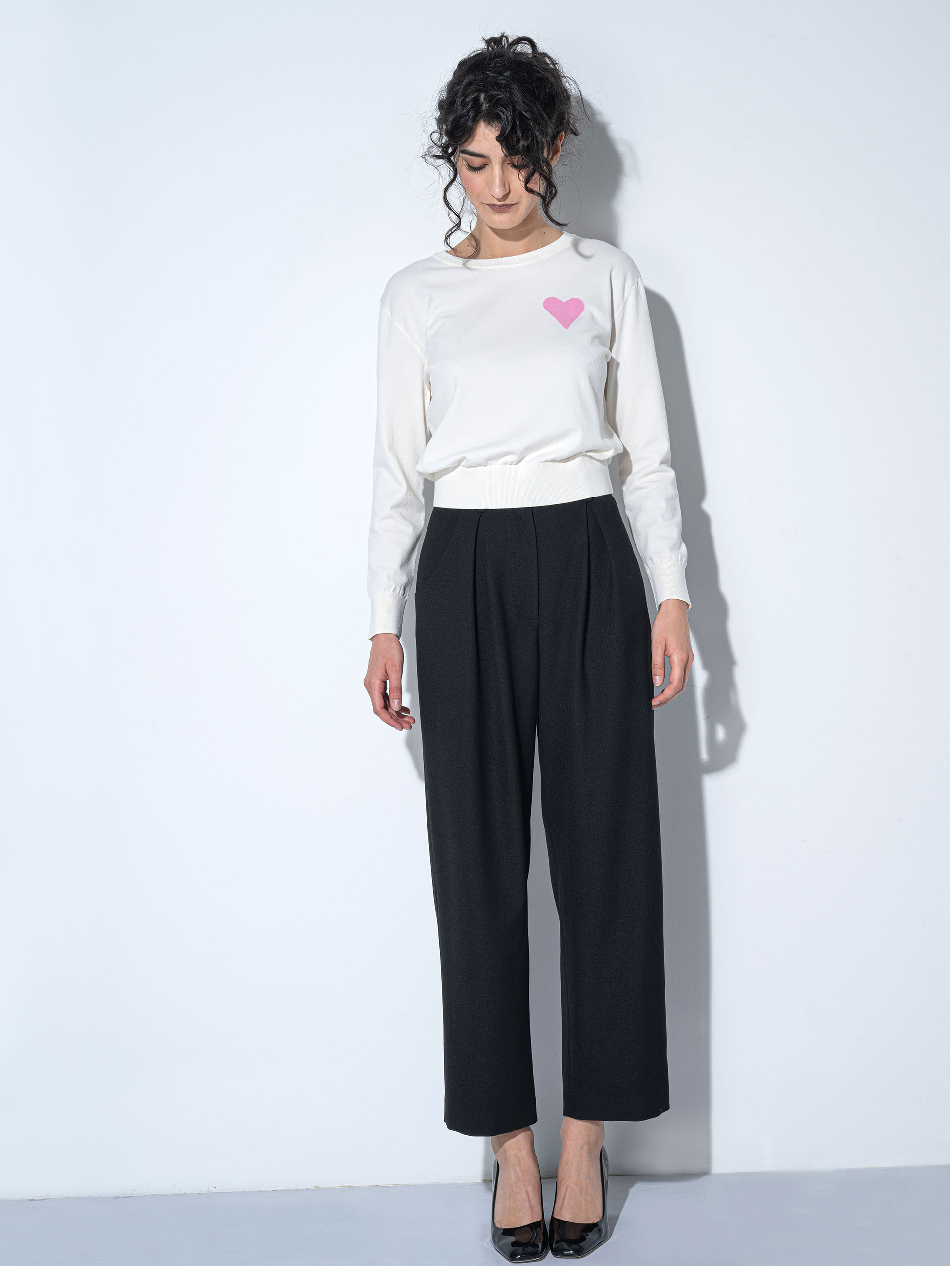 high rise black pleated pants white sweater • Sassa Björg